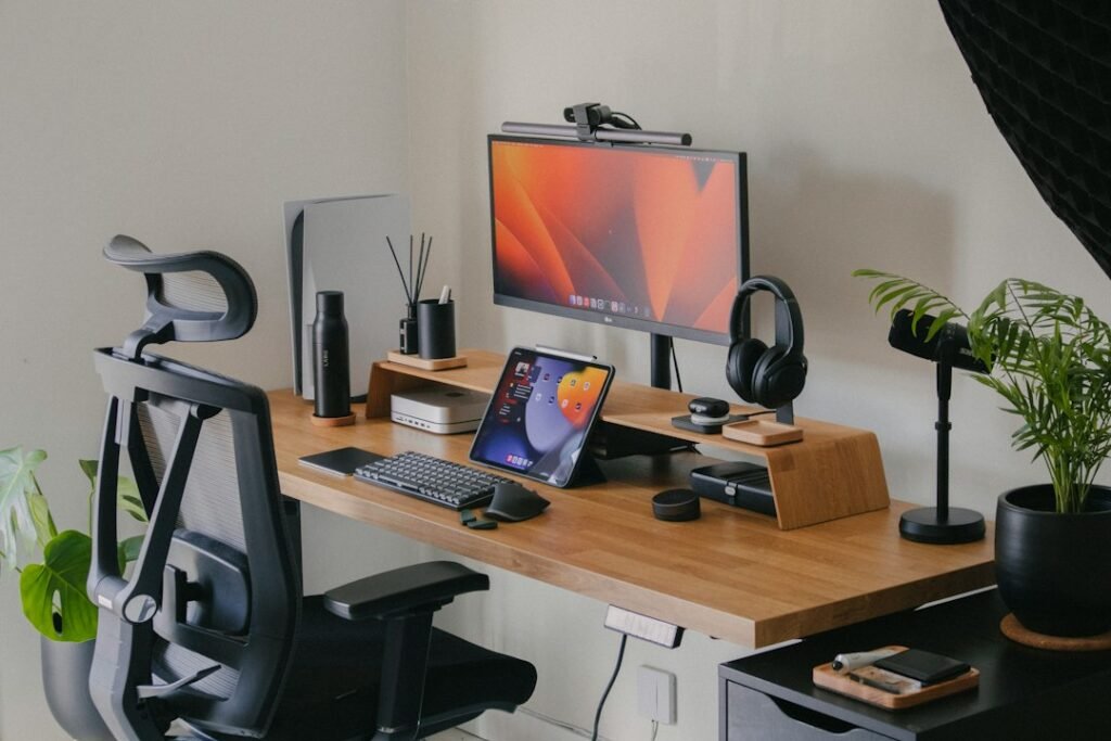 Desktop computer on a wooden desk in a home office