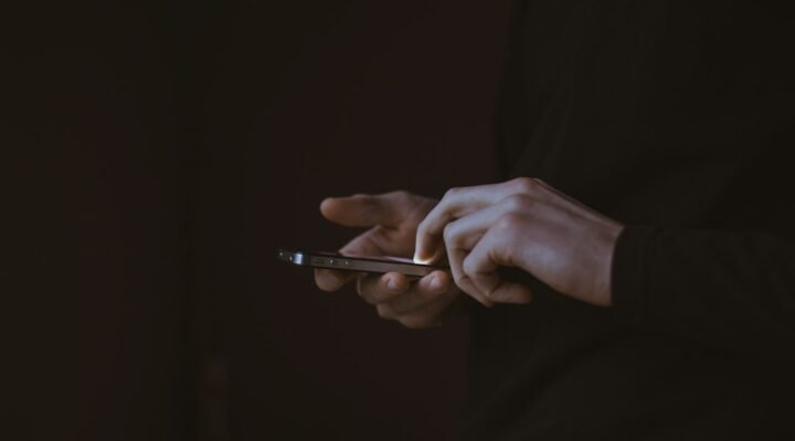 Man searching on his smartphone